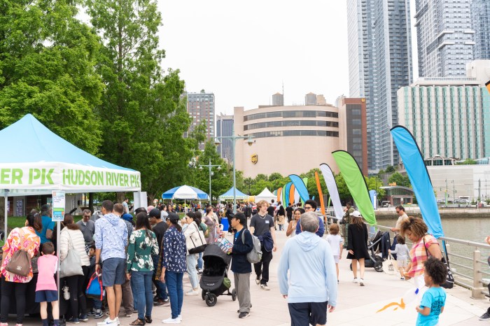 outdoor festival in a park with may people